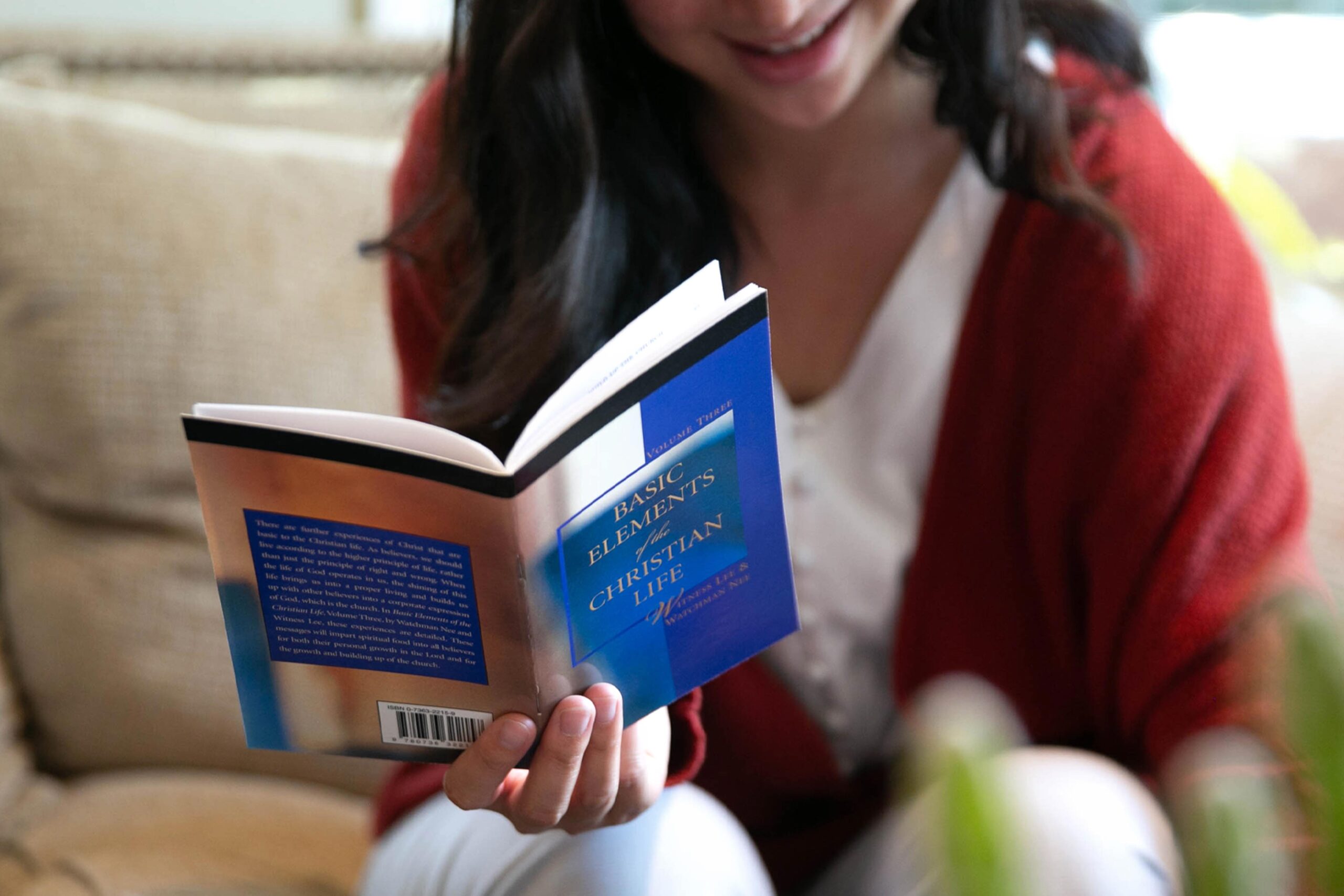 4 (4) woman reading booklet