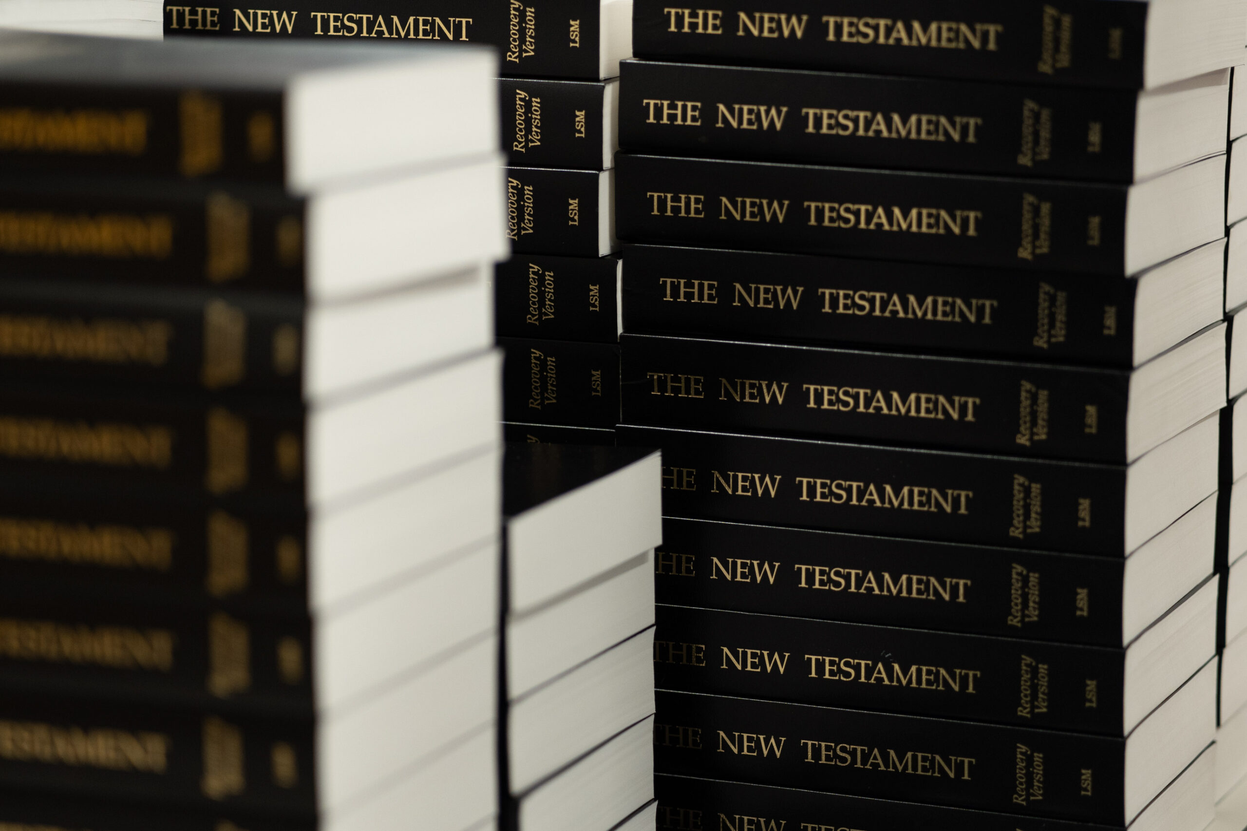 Stack of New Testament Recovery Bibles being prepared for shipping